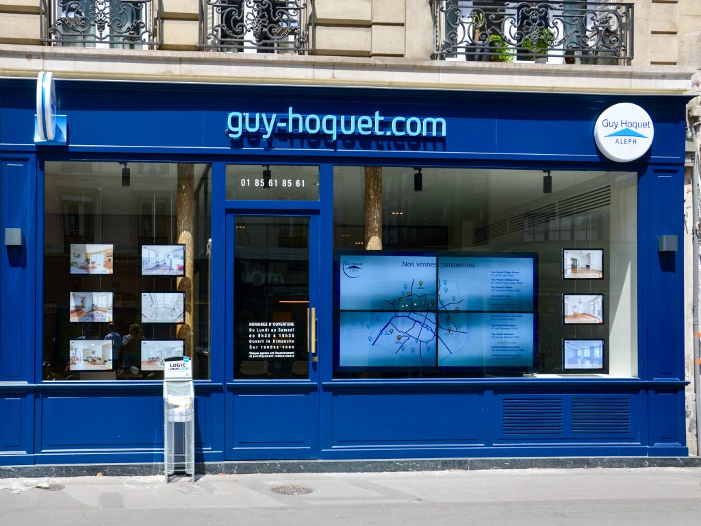 Nouvelle devanture de l'agence immobilière Gui-Hoquet.com en IDF